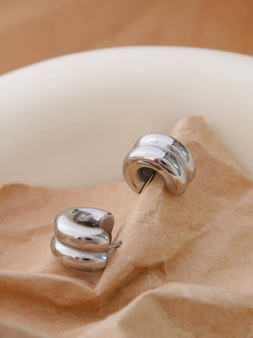 Close-up of Emma silver double C-hoop earring — hypoallergenic stainless steel jewelry