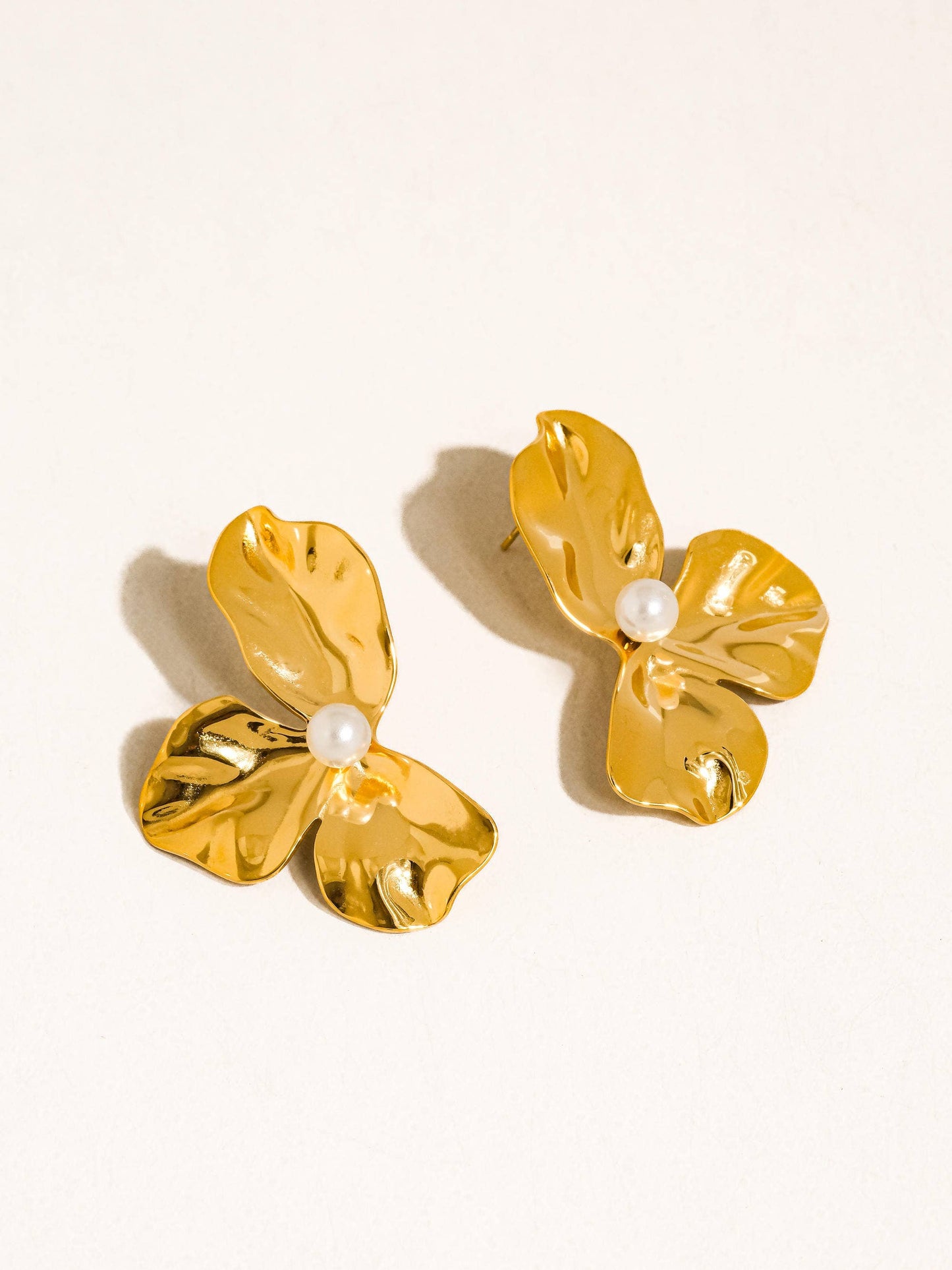 Vintessa 18K gold flower shell pearl drop earrings, hypoallergenic, on white background
