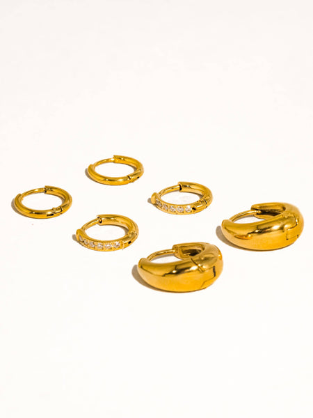 Set of three 18K gold hoop earrings in mixed sizes with cubic zirconia, tarnish-free and hypoallergenic