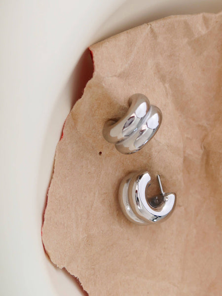 Silver double C-hoop earrings on white background — stainless steel, non-tarnish
