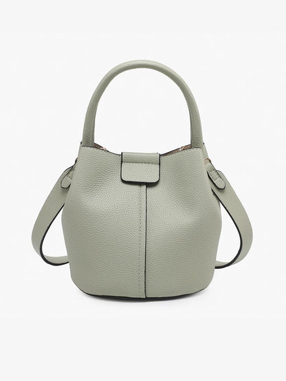 Sage green vegan leather bucket bag with top handle and snap closure