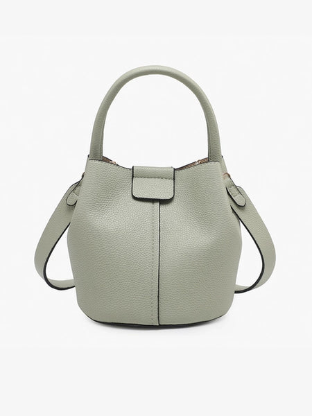 Sage green vegan leather bucket bag with top handle and snap closure