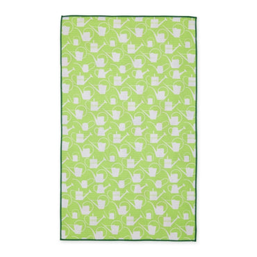 Reversible kitchen towel with watering can pattern on green background
